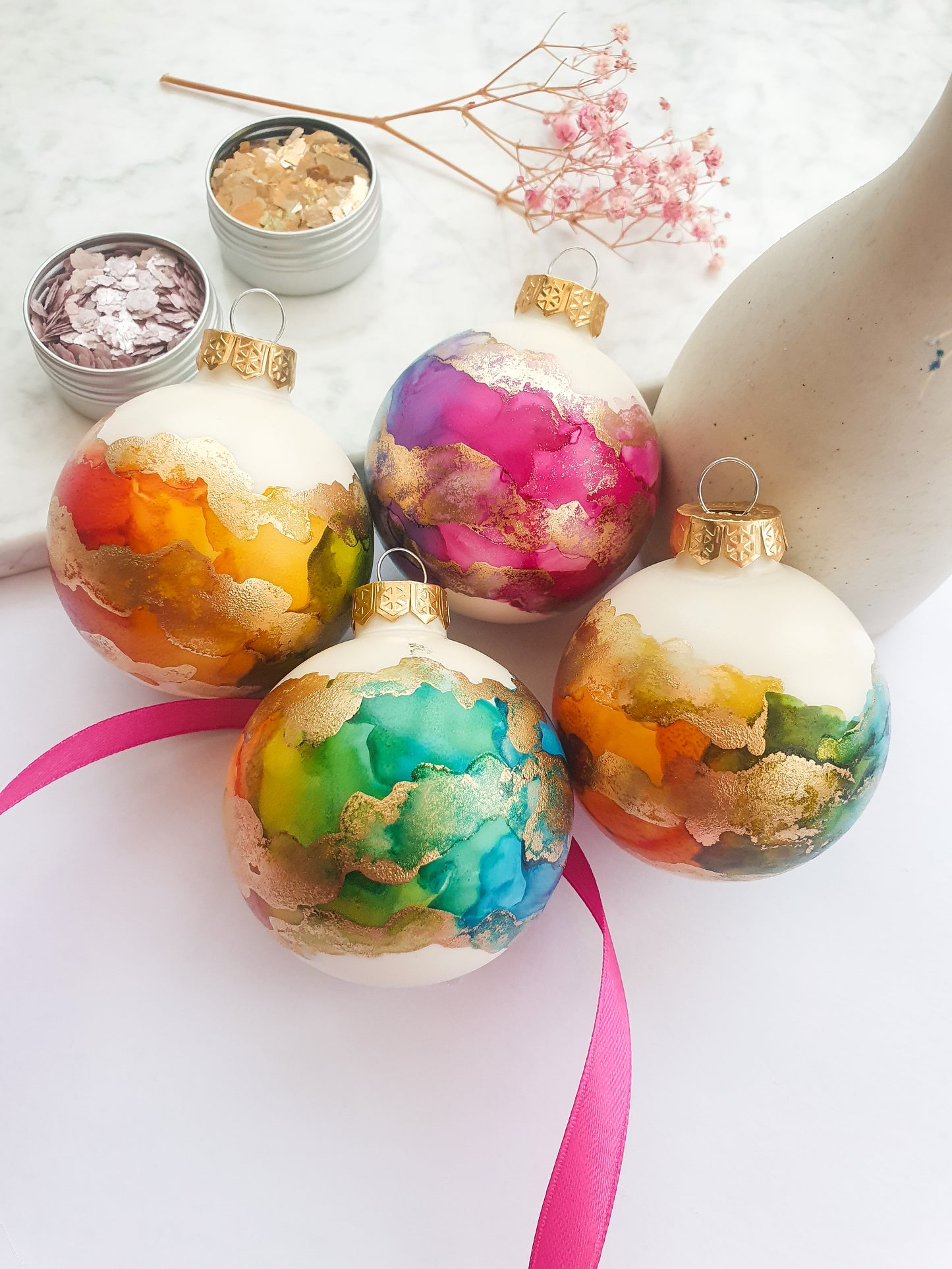 A Set of Four Ivory Rainbow & Gold Glass Baubles / Hand Painted With Alcohol Inks