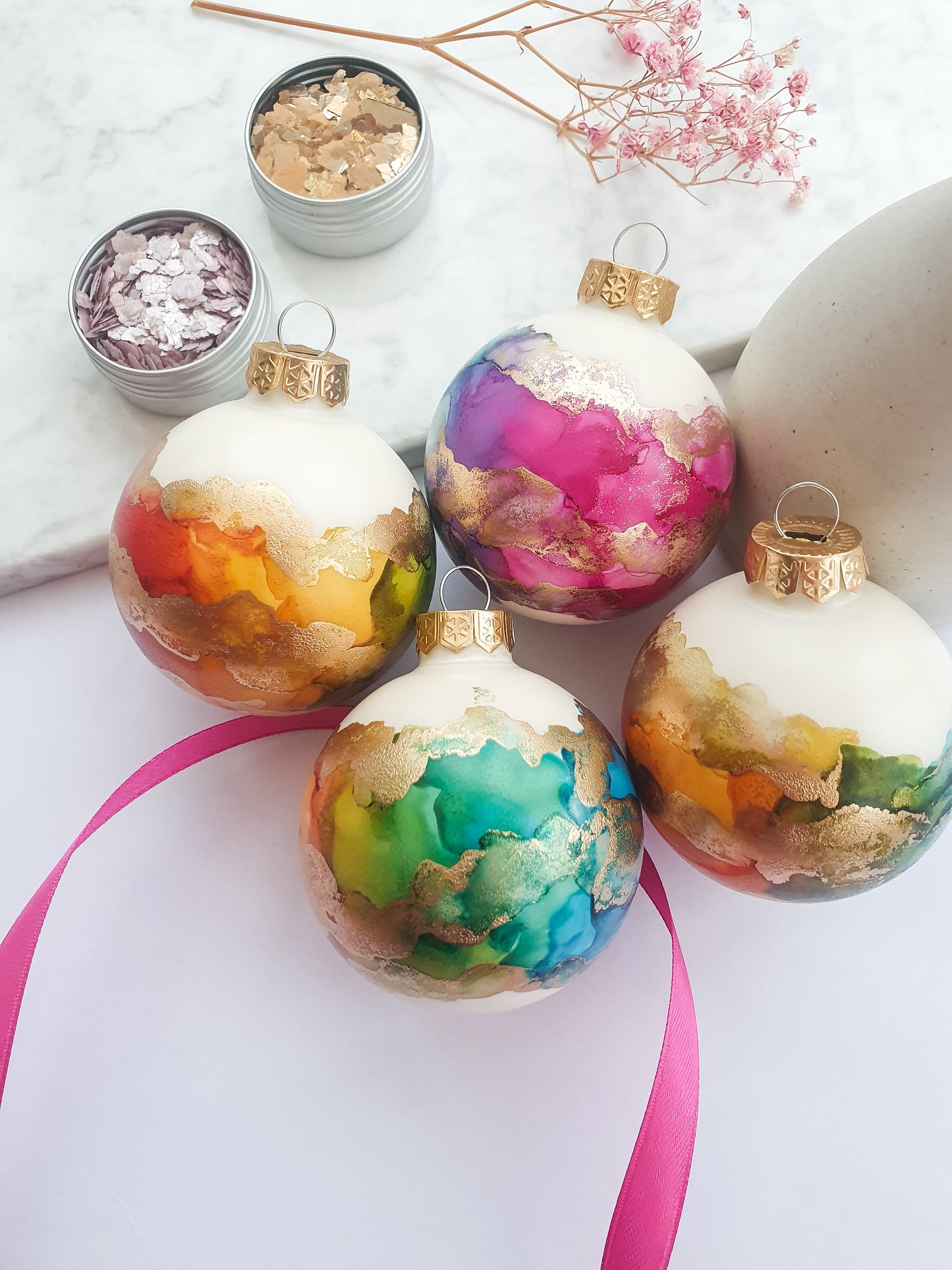 A Set of Four Ivory Rainbow & Gold Glass Baubles / Hand Painted With Alcohol Inks