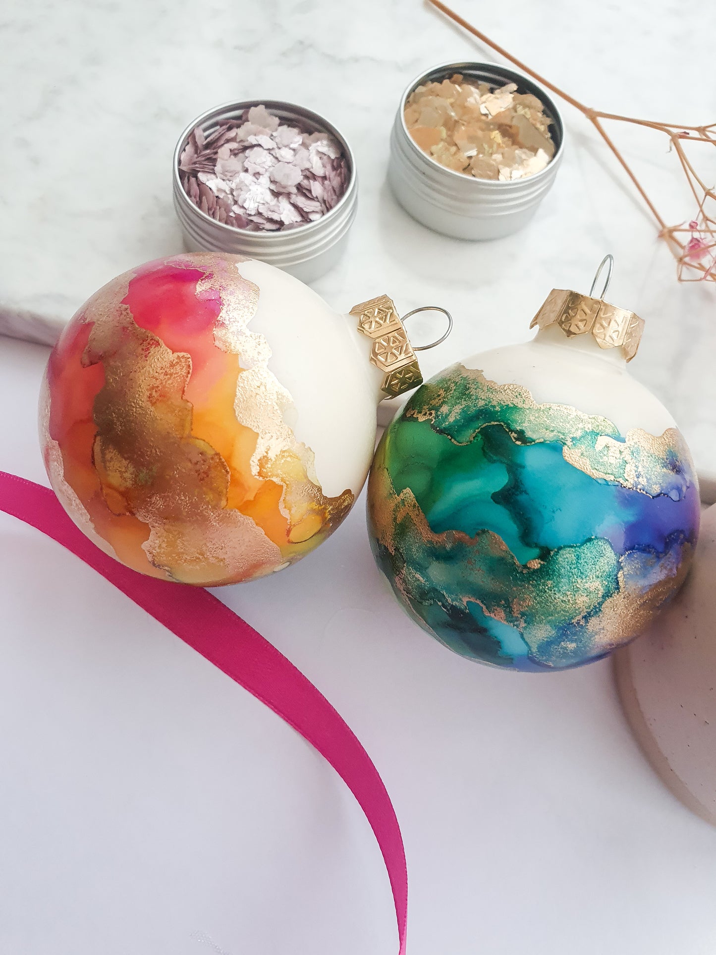 A Set of Two Ivory Rainbow & Gold Glass Baubles / Hand Painted With Alcohol Inks